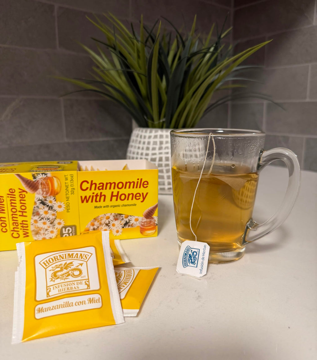 Side view of Hornimans honey chamomile tea packaging detailing brewing instructions.