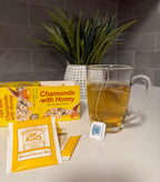 Side view of Hornimans honey chamomile tea packaging detailing brewing instructions.