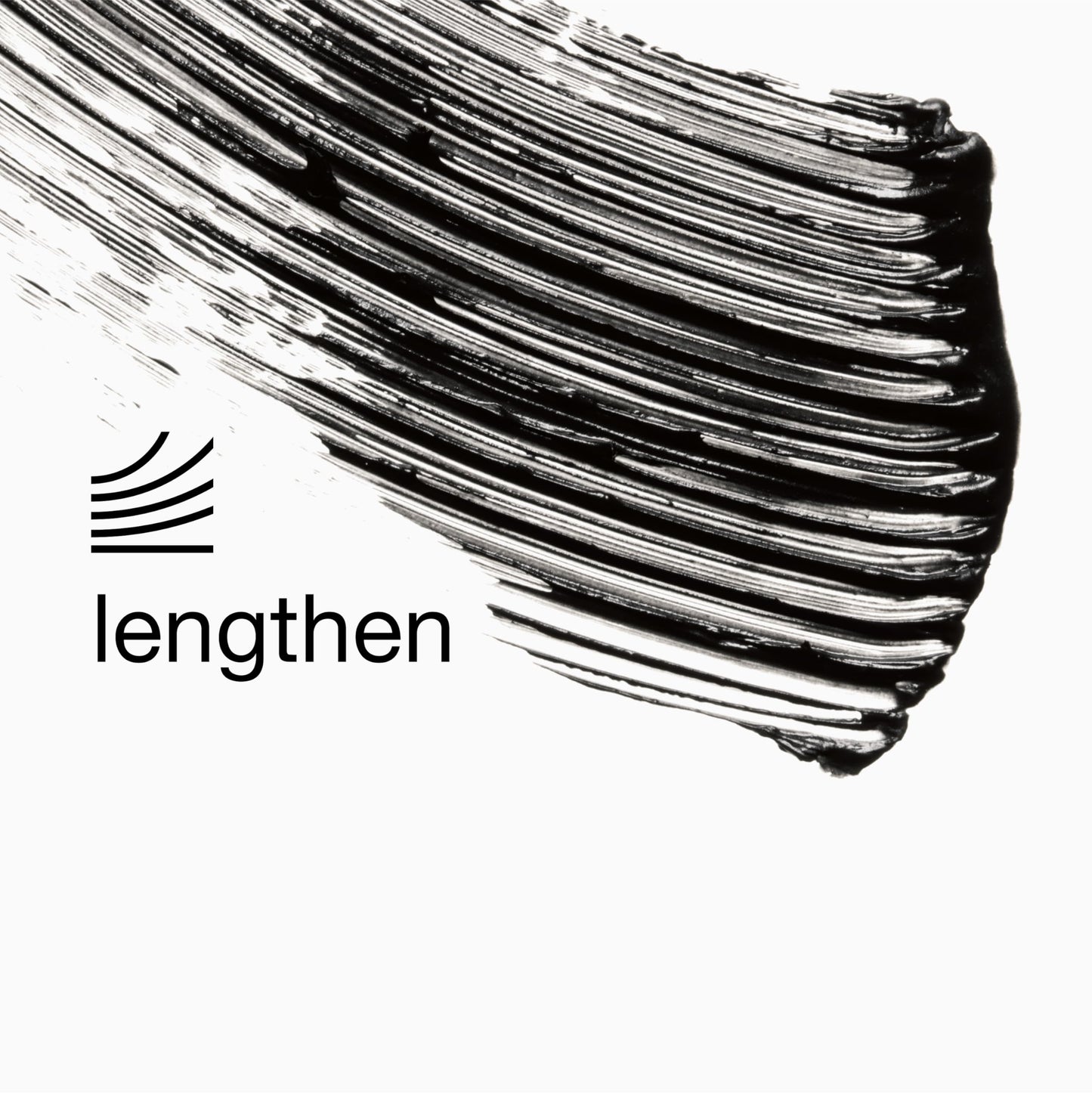 Close up of the slim mascara applicator brush designed for defining short lower eyelashes