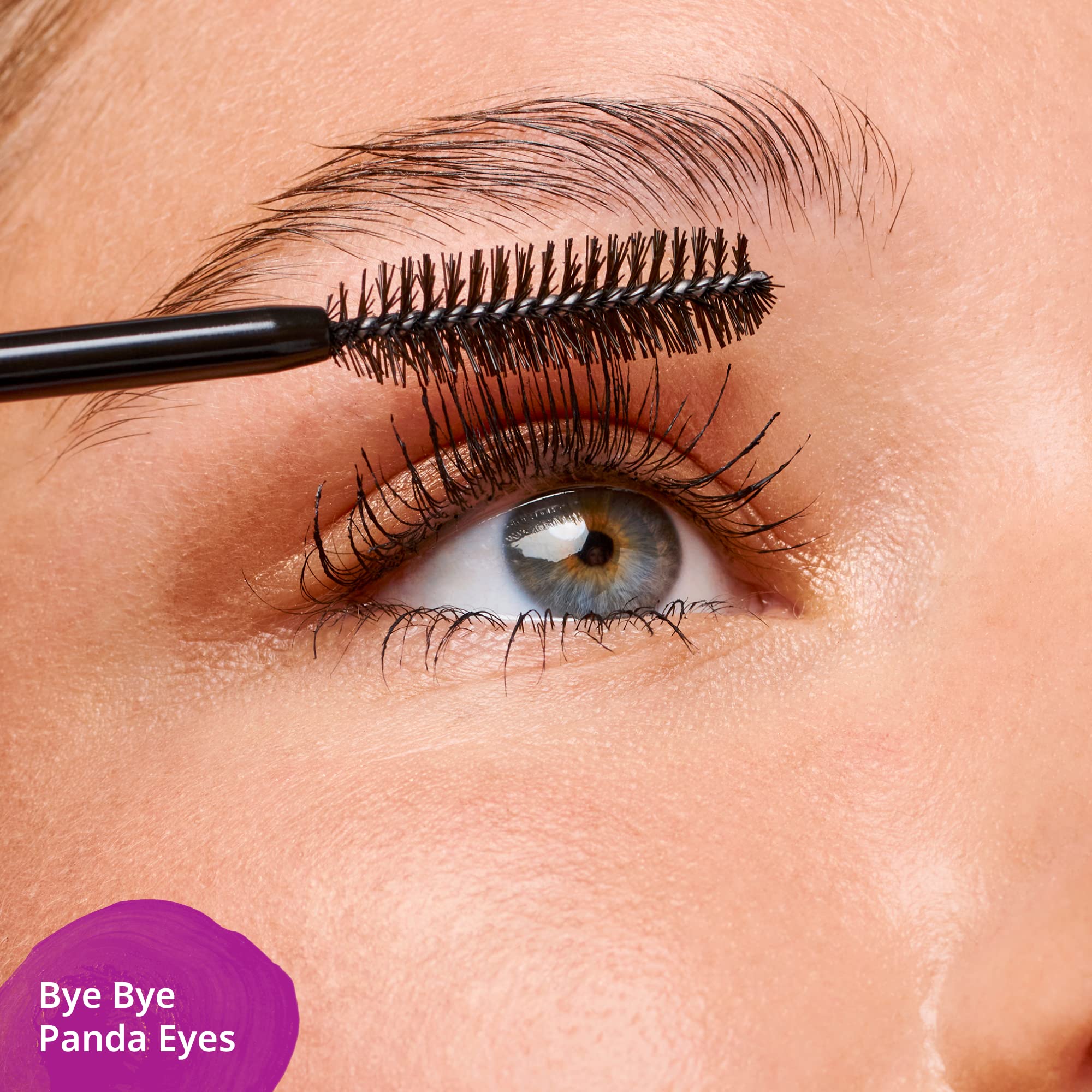 Authentic Essence black mascara tube showing USA imported product labels.