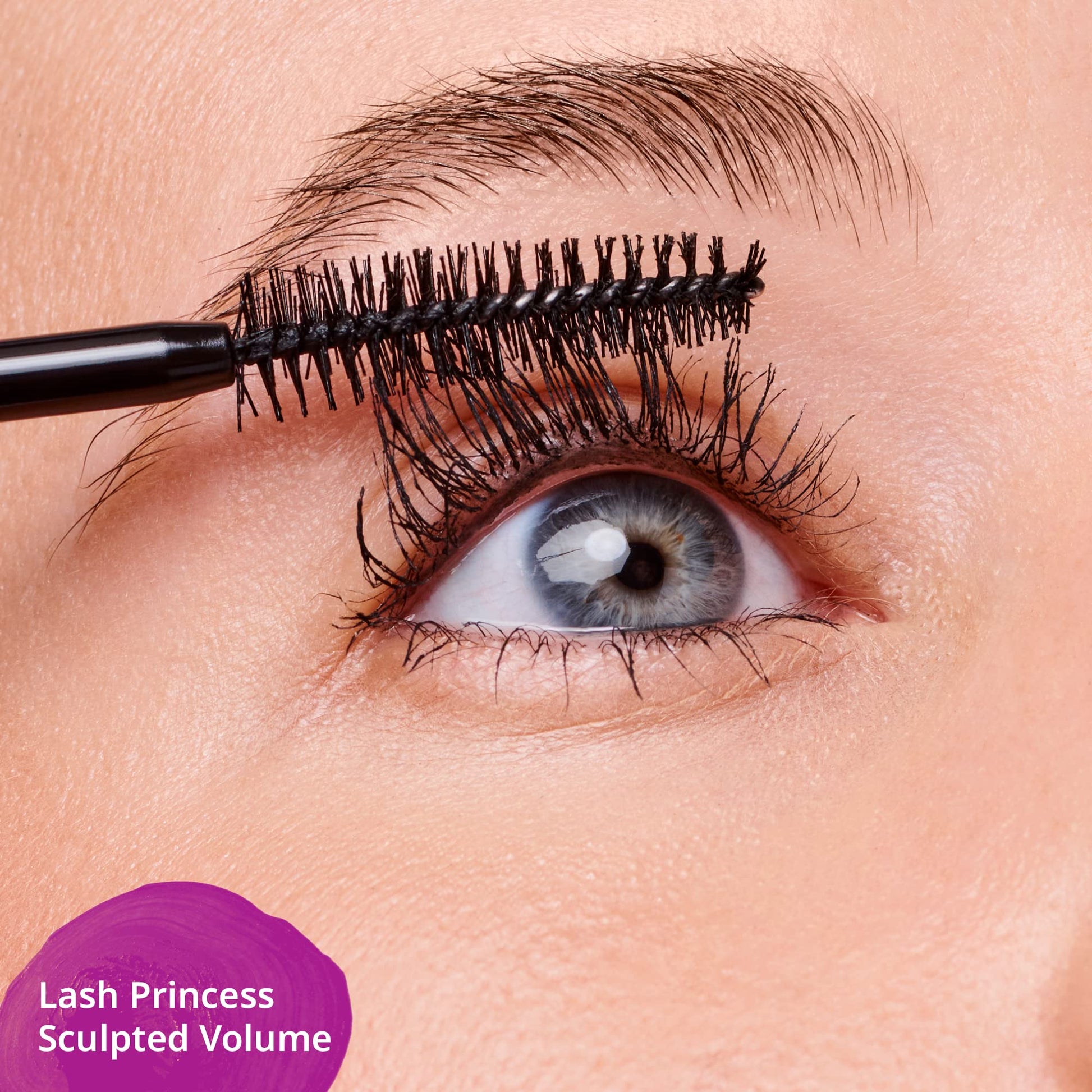 Essence Lash Princess Sculpted Volume Mascara tube lying down on a clean cosmetic display background.