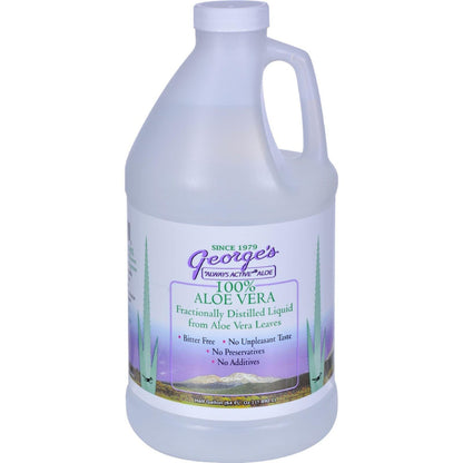 Authentic imported George's aloe vera distillate clear supplement bottle displayed on a white wellness counter