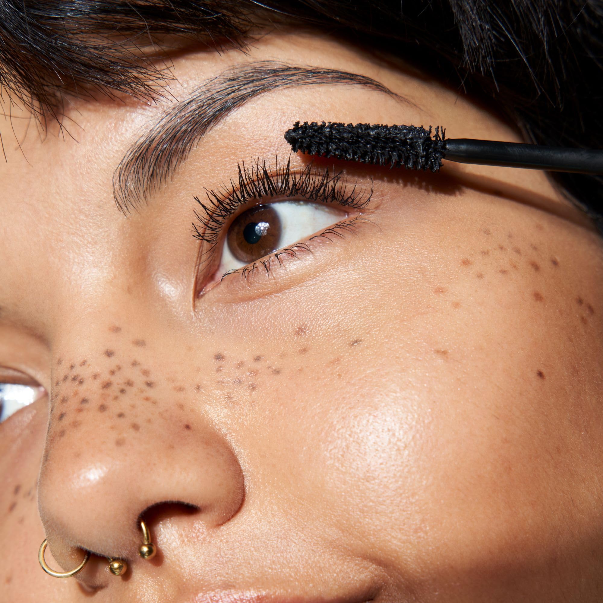 Cruelty free and paraben free black mascara tube placed on a clean background