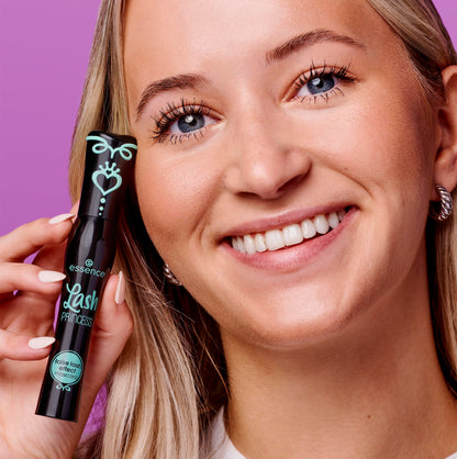Essence Lash Princess Mascara applicator wand removing from the tube showing product distribution