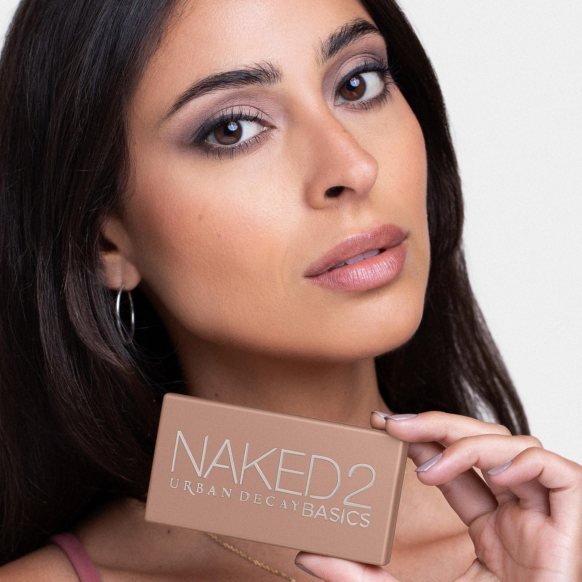 Professional makeup look using Urban Decay Naked 2 Basics