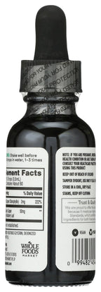 Close up of the dropper cap and label on Whole Foods liquid chlorophyll peppermint concentrate.