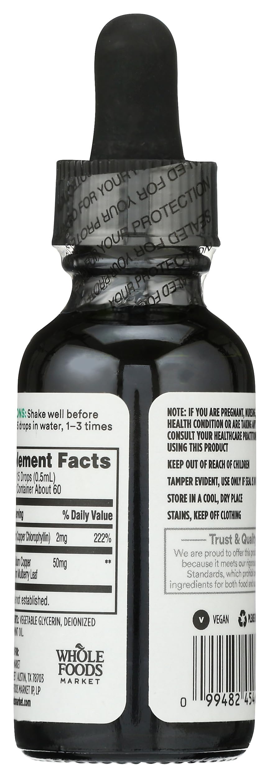 Close up of the dropper cap and label on Whole Foods liquid chlorophyll peppermint concentrate.