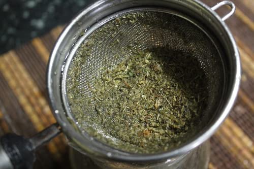 Authentic Neotea Kalmegh herbal powder container highlighting immune support features.