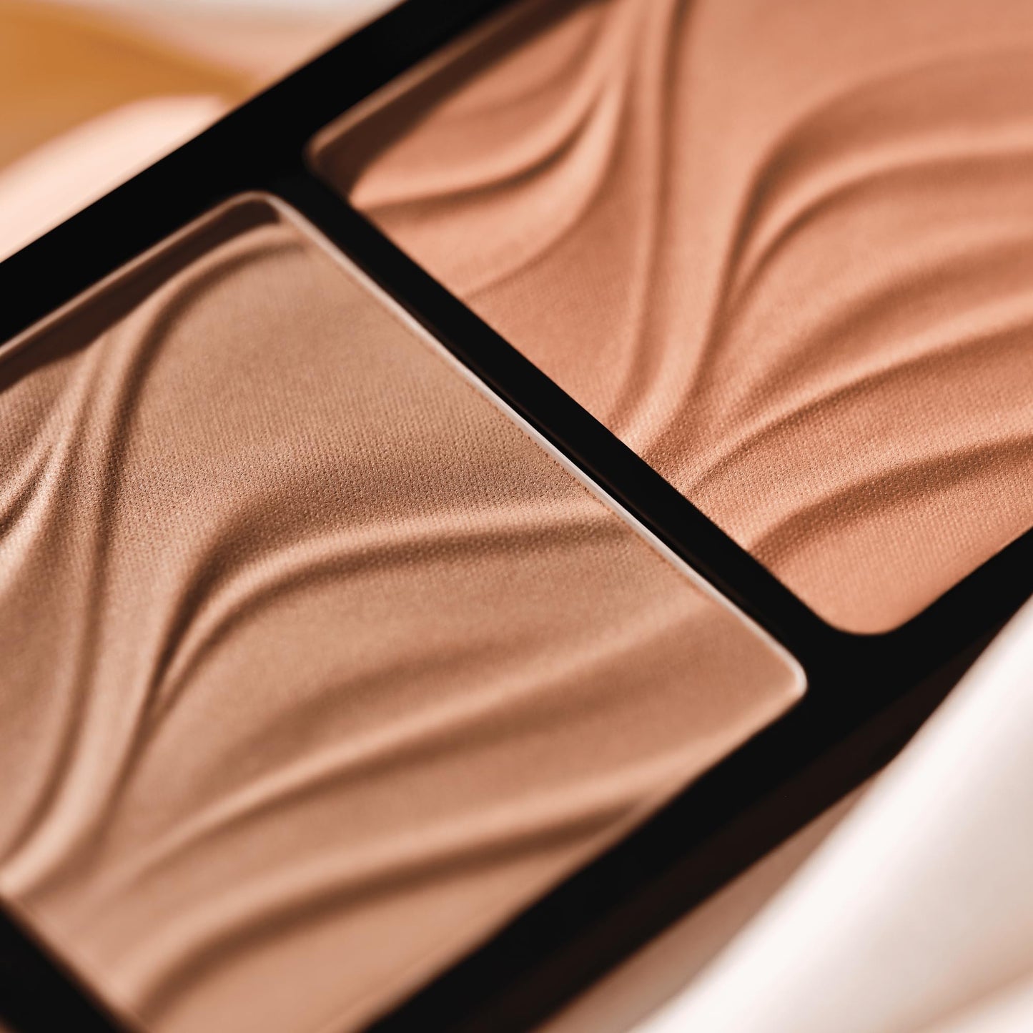 Professional makeup artist using Catrice contouring duo palette