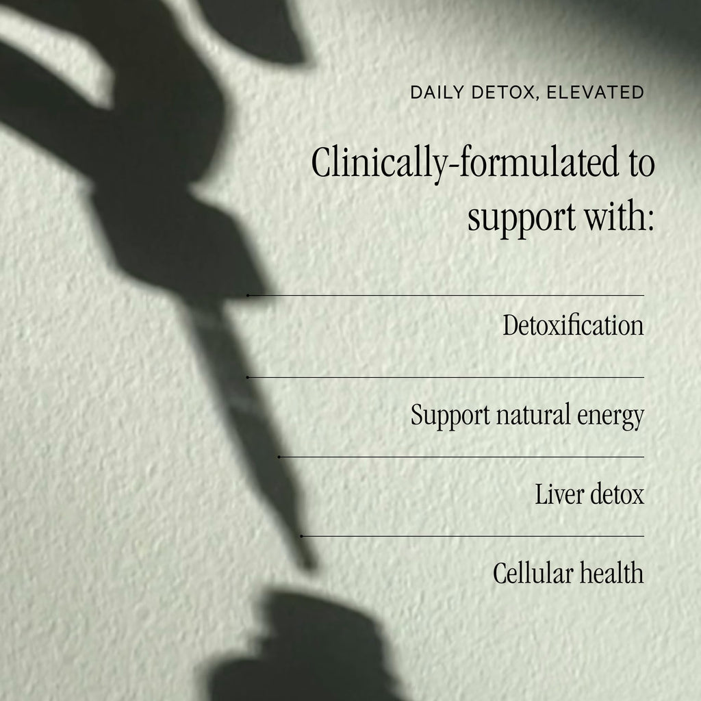 Close-up of the dropper mechanism for Juna daily wellness liquid supplement showing exact measurement