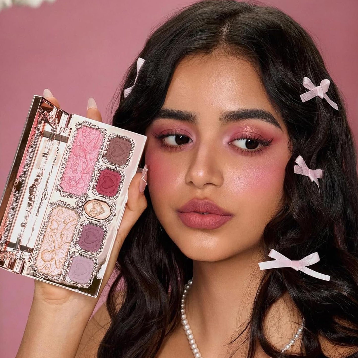 Side profile of Flower Knows pink and gold makeup palette casing