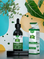 Chlorophyll liquid drops 59 milliliters size compared to hand size for scale