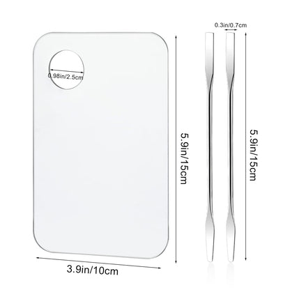 Two clear acrylic makeup mixing trays with thumb holes
