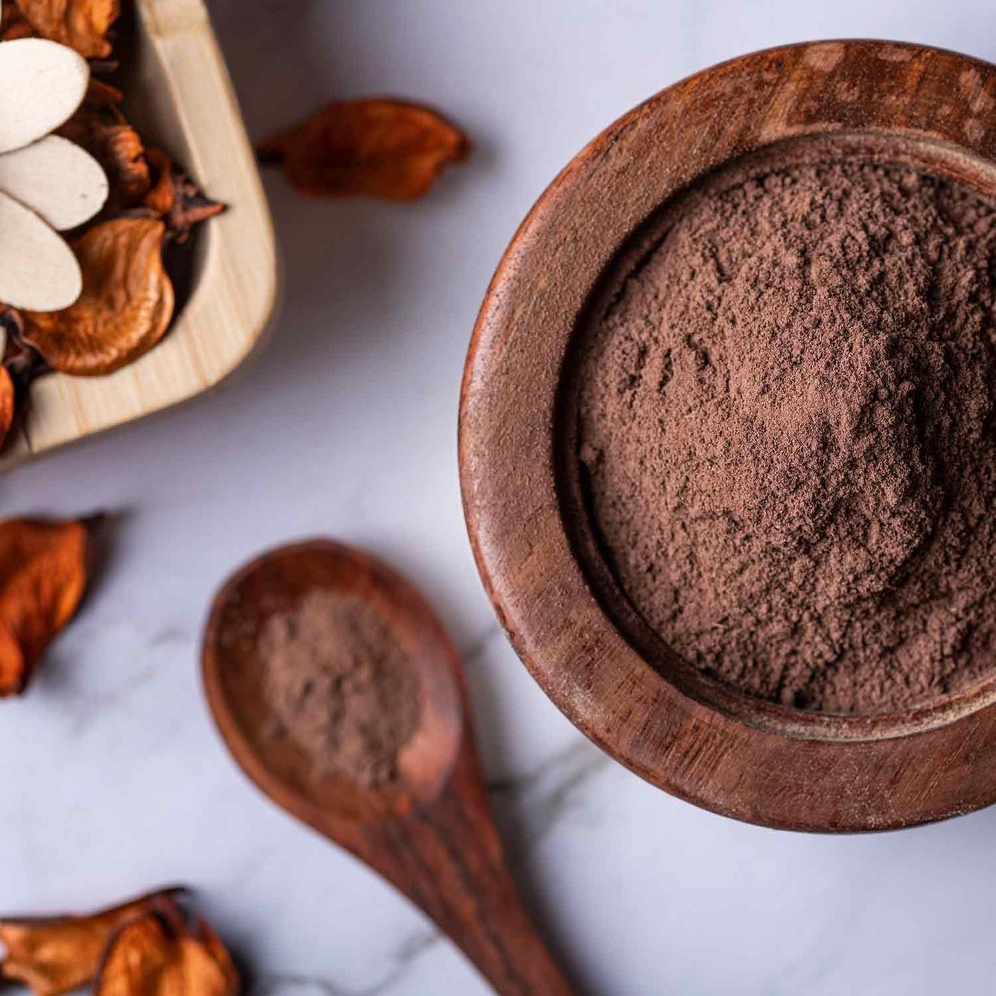Natural Ayurvedic cardiovascular support supplement being scooped for daily mixing.
