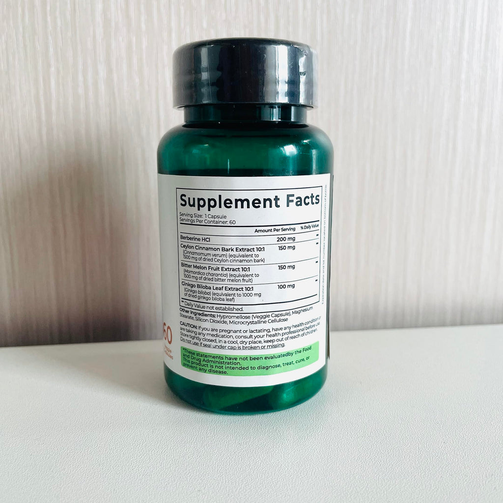 Side view of Divinity Nutra 4-in-1 Berberine dietary supplement bottle