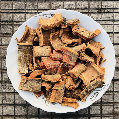 DKM Organics Arjuna Bark Powder mixed into a warm herbal milk decoction for cardiovascular support.