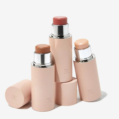 Model demonstrating the no-makeup makeup look using EarthsCure buildable cream sticks