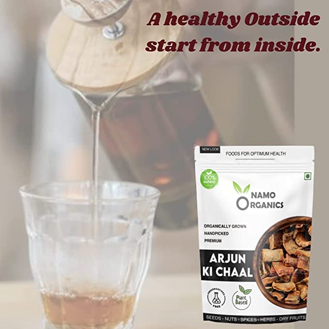 Authentic Ayurvedic herbal tea preparation using boiled Terminalia arjuna tree bark.