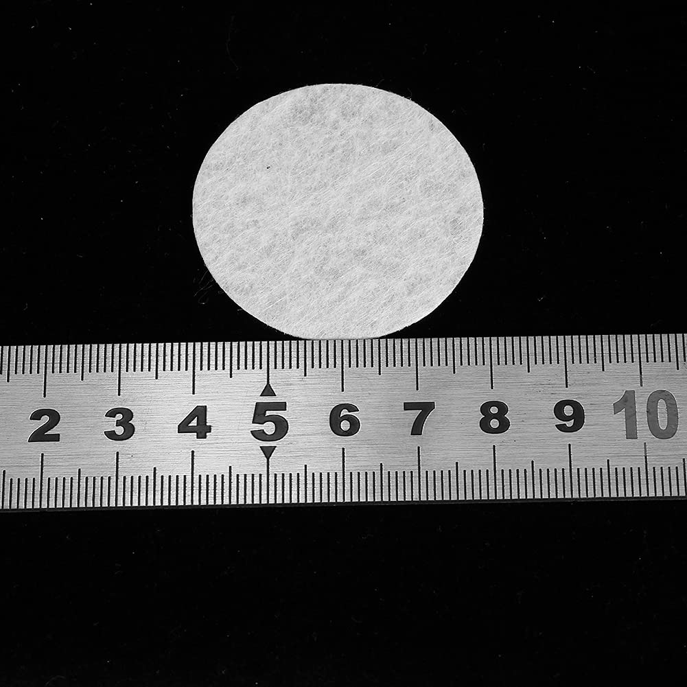 White replacement cotton filter pads laid out to show the exact 40mm diameter measurement.