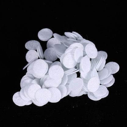 Disposable vacuum filters for blackhead removal machines being inserted into a beauty tool handle.