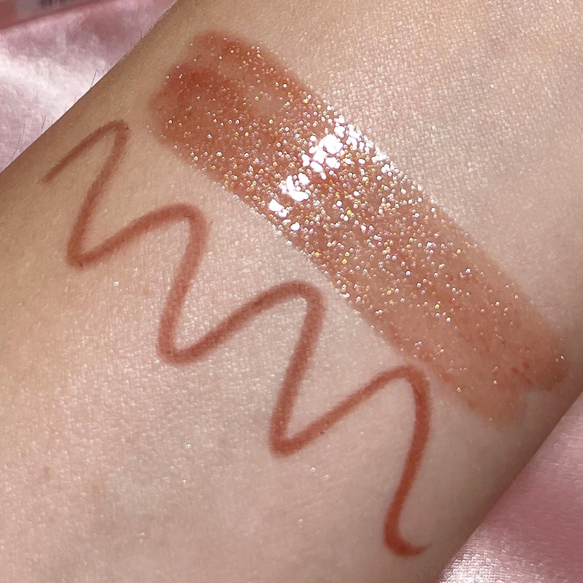 Close up of the non sticky golden nude gloss wand texture