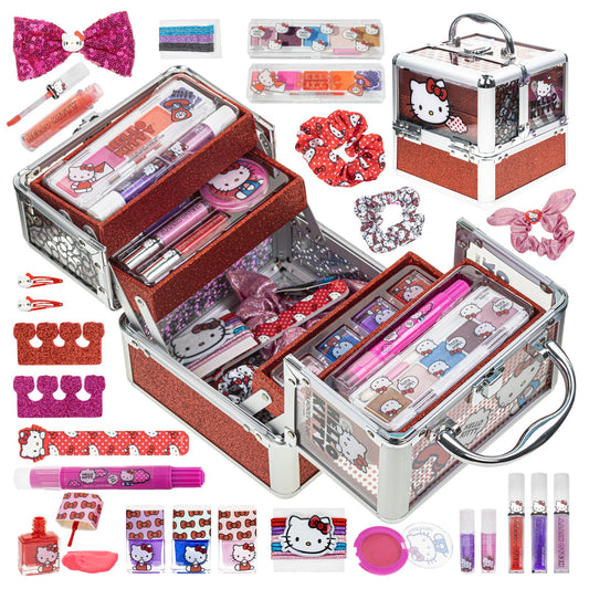 Townley Girl Hello Kitty kids makeup kit opened to display lip glosses, eyeshadows, and brushes inside.