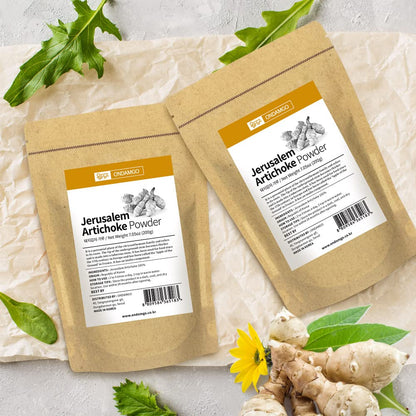 Scooping ONDAMGO prebiotic artichoke powder to mix into a nutritious green wellness smoothie.