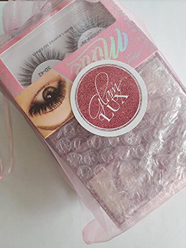 Glam Lux five piece full size cosmetic set arranged neatly next to its travel friendly pink zipper case.