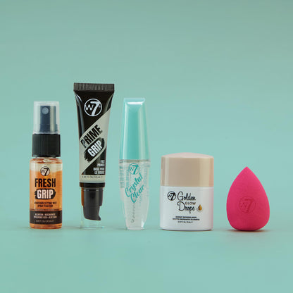 W7 pocket sized everyday glam toolkit items laid out on flat surface