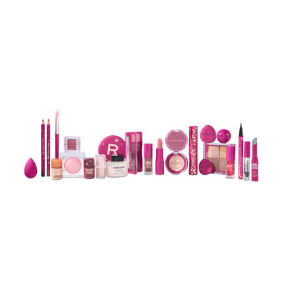 Revolution Beauty 24 piece cosmetic gift box opened showing numbered daily surprise doors