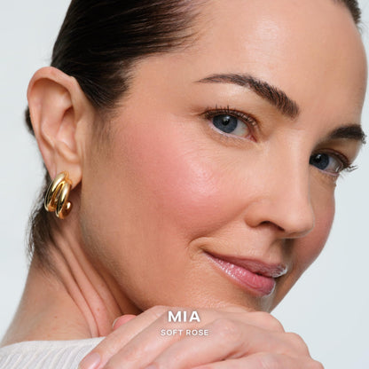 Saie talc-free powder blush in shade Mia open packaging showing soft pink hue