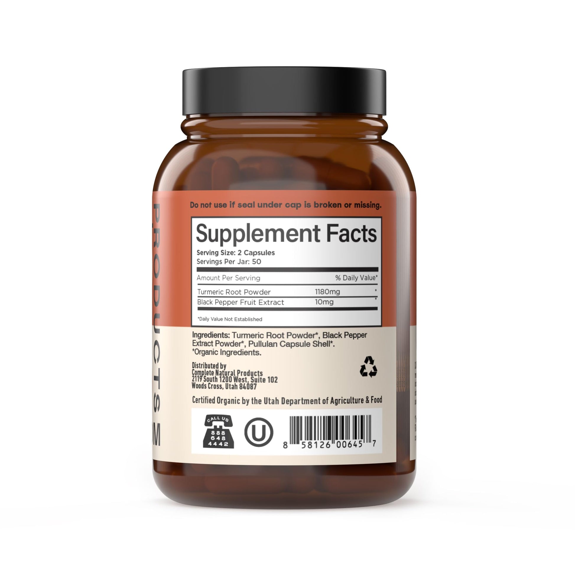 Organic turmeric and black pepper supplement capsules in glass packaging