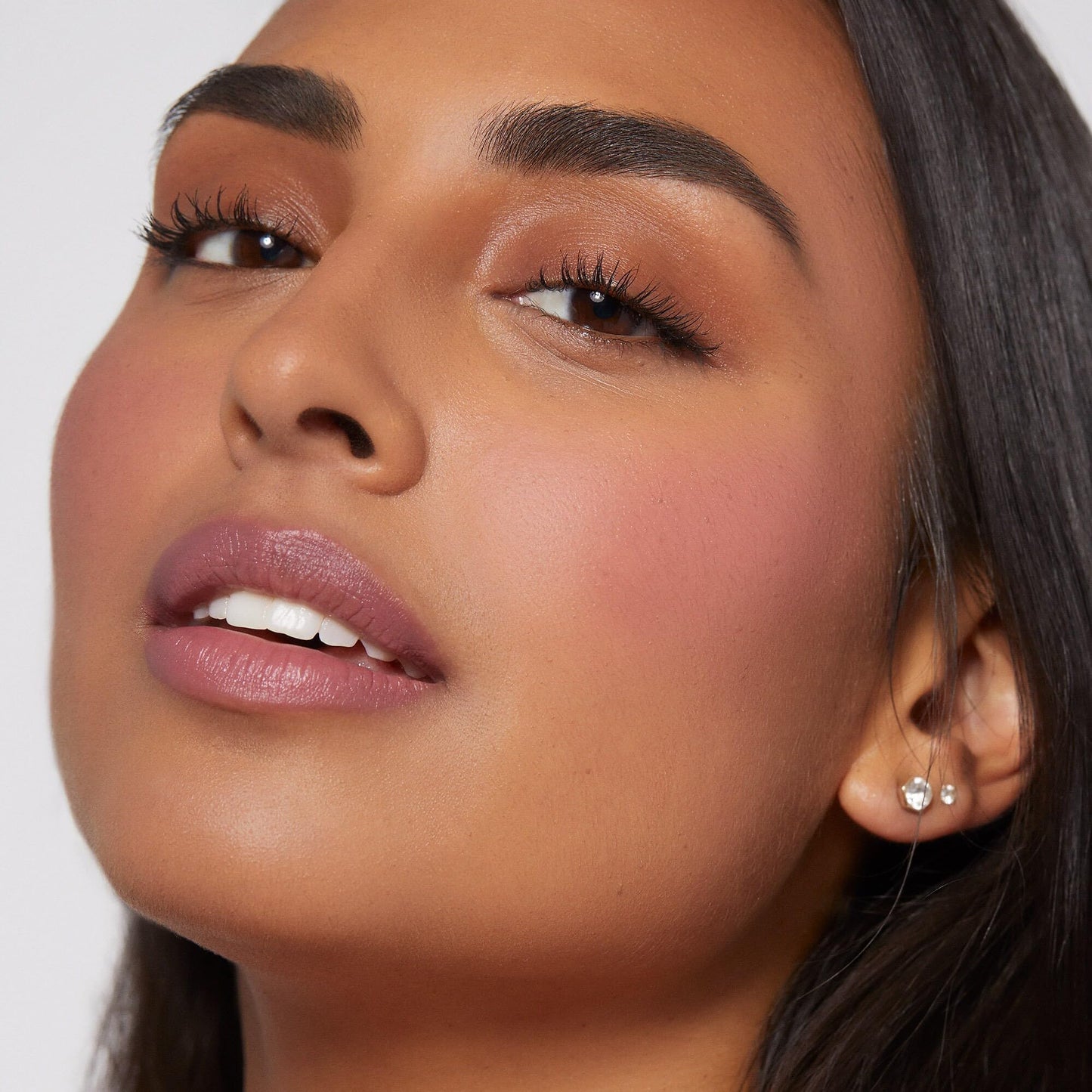 Rare Beauty Soft Pinch blush applicator showing product texture and shade vibrancy