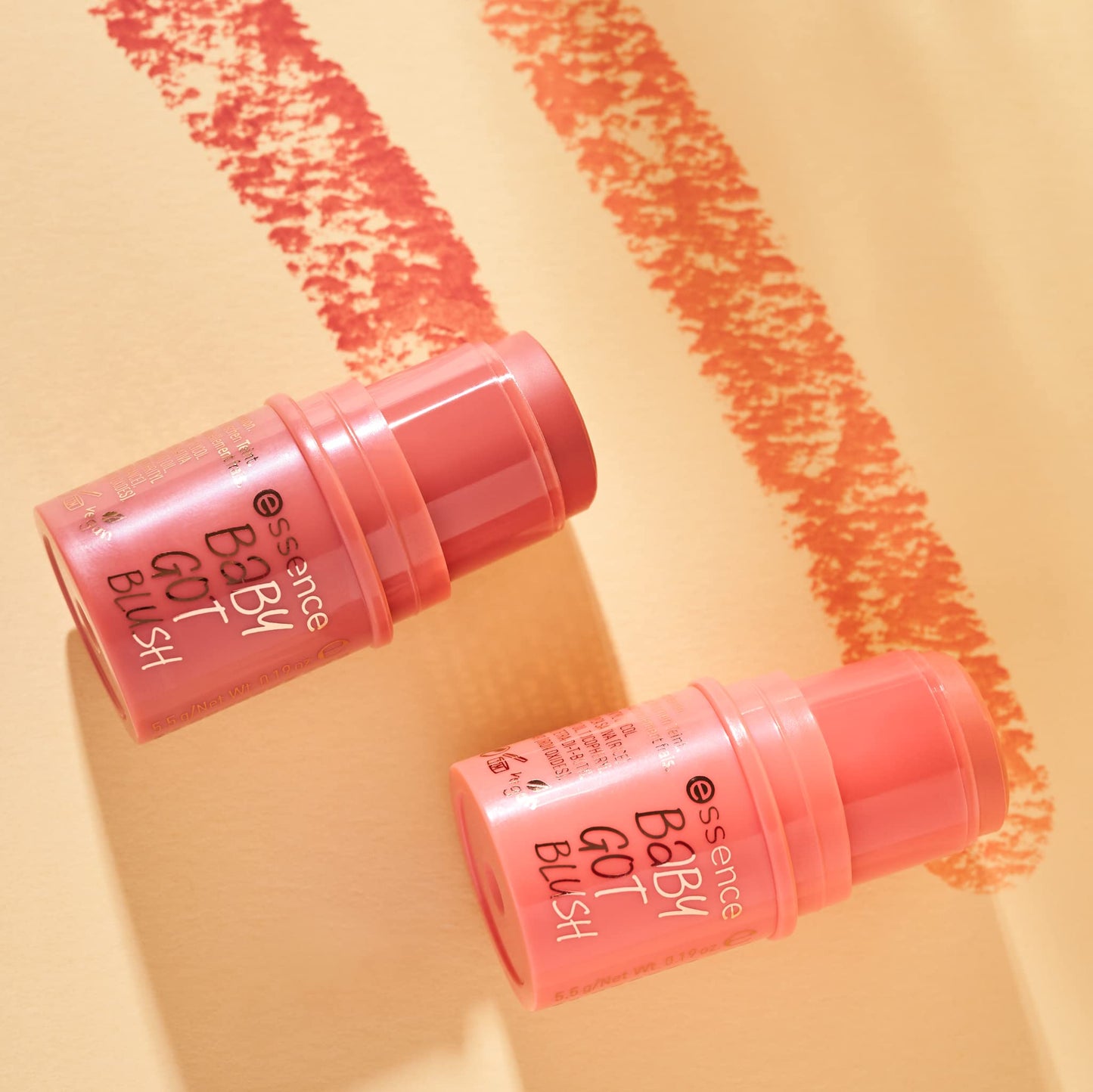 Essence Cosmetics highly pigmented dewy finish pink blush stick on a clean background
