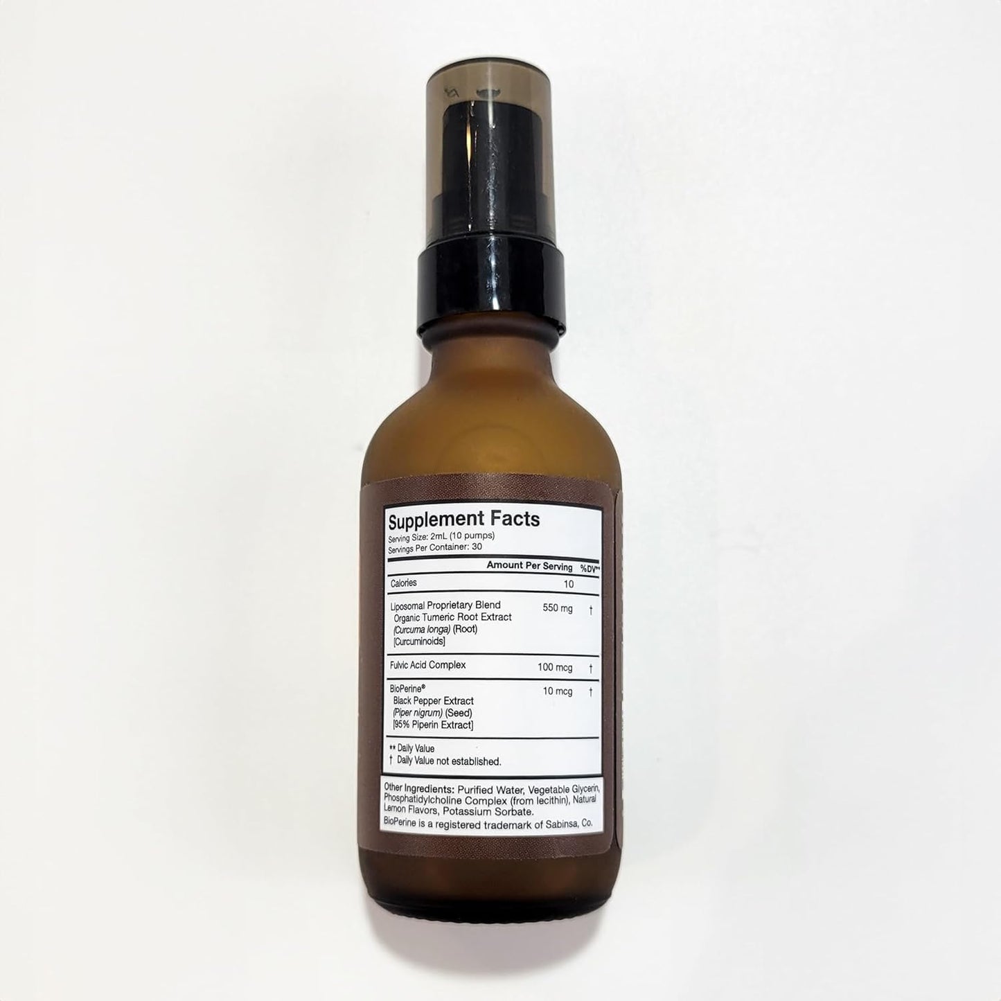 Liquid turmeric supplement bottle with high absorption branding
