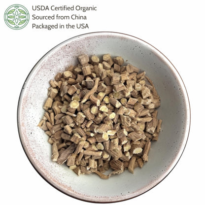Cut and sifted dried Huang Qi herbal supplement bag close up view.