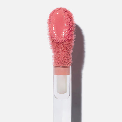 Hydrating liquid cheek flush tube displayed upright for clean beauty routines.