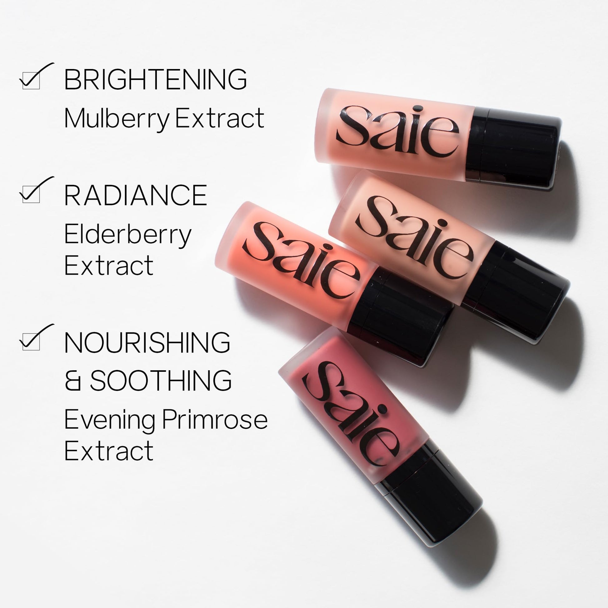 Dewy pink cream cheek tint packaging highlighting the clean vegan formula.