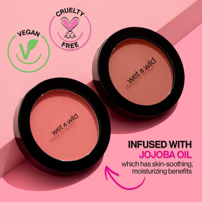Wet n Wild Pinch Me Pink blush swatched on skin illustrating buildable pigmentation