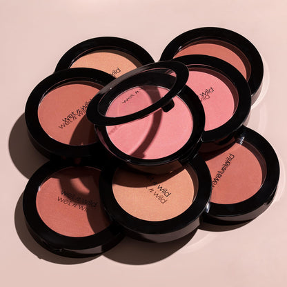 Wet n Wild imported cosmetic blush compact styled next to natural beauty ingredients