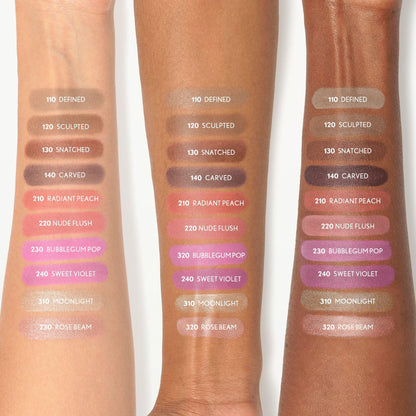 Lifestyle shot of CoverGirl Skin Enhancer cream blush stick next to a makeup brush