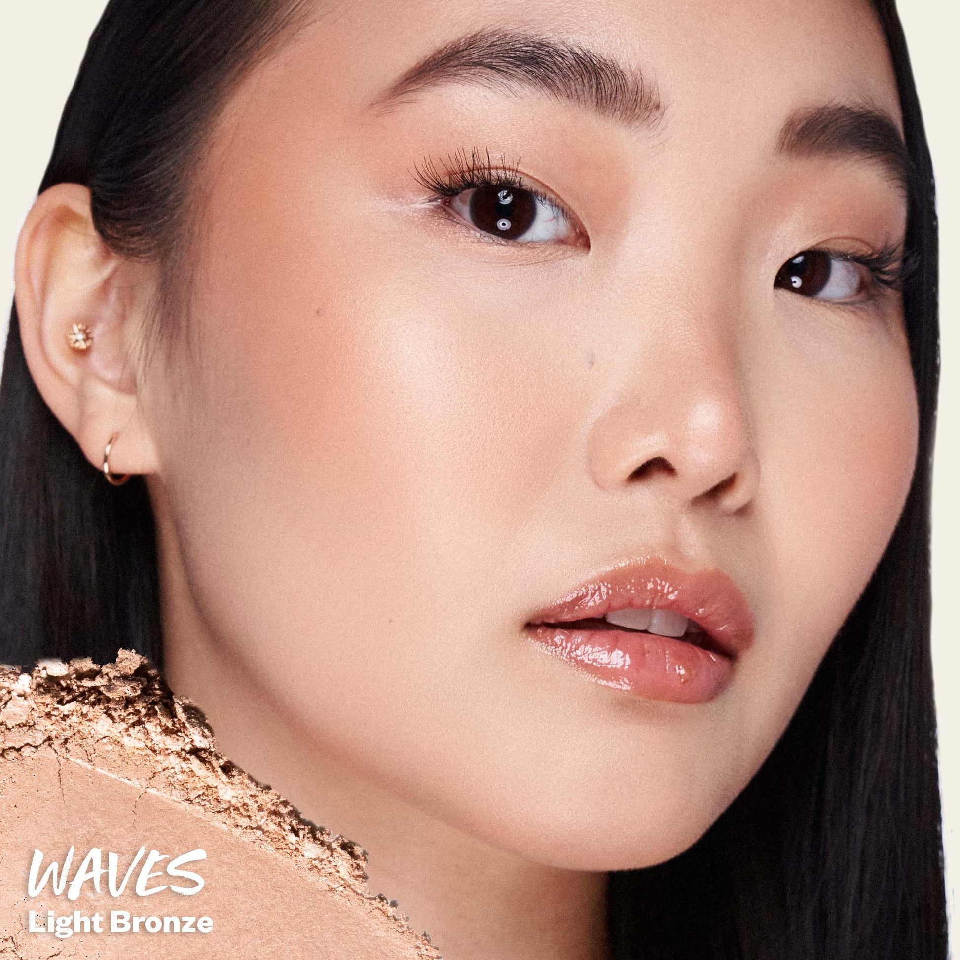 Kosas clean talc free baked bronzing powder in medium bronze shade Waves open compact