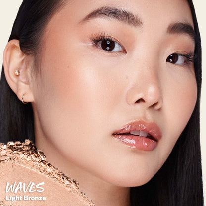 Kosas clean talc free baked bronzing powder in medium bronze shade Waves open compact