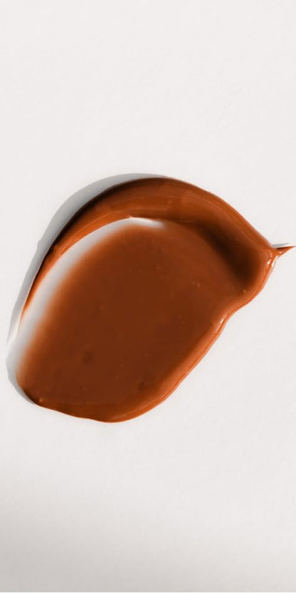 Texture shot showing the sheer mineral pigment fluid of Dr. Hauschka translucent tint