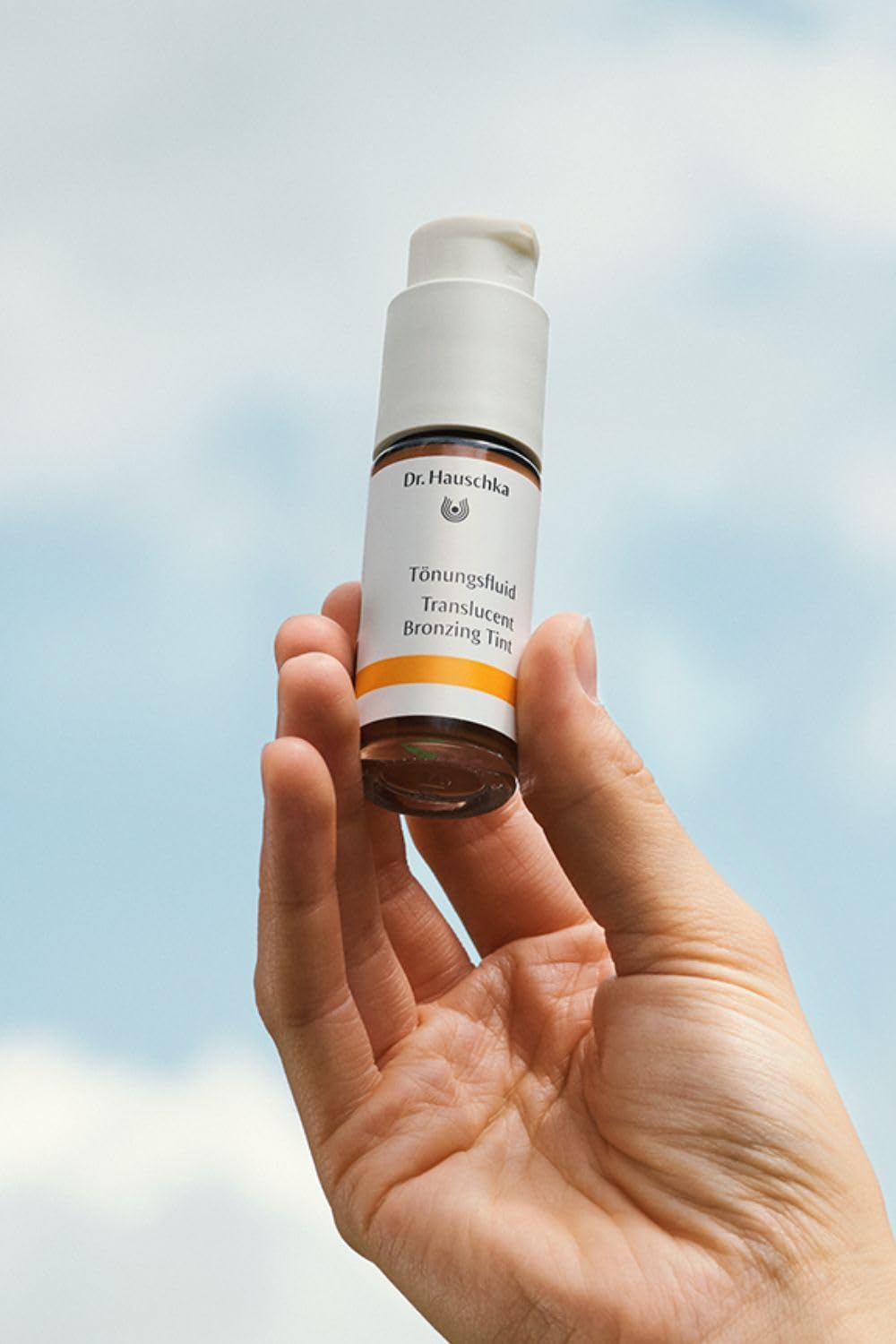 Back label of Dr. Hauschka Translucent Bronzing Tint displaying botanical ingredients
