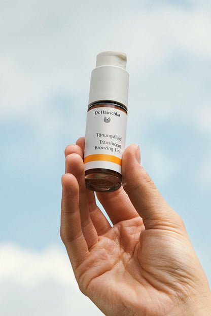 Back label of Dr. Hauschka Translucent Bronzing Tint displaying botanical ingredients