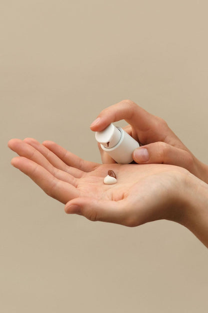 Dr. Hauschka face liquid bronzer showing pump dispenser top view