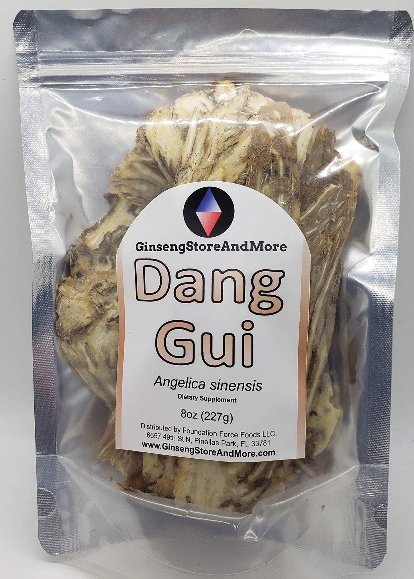 Sliced dried Angelica sinensis roots showing the natural yellowish-brown color and pliable texture.