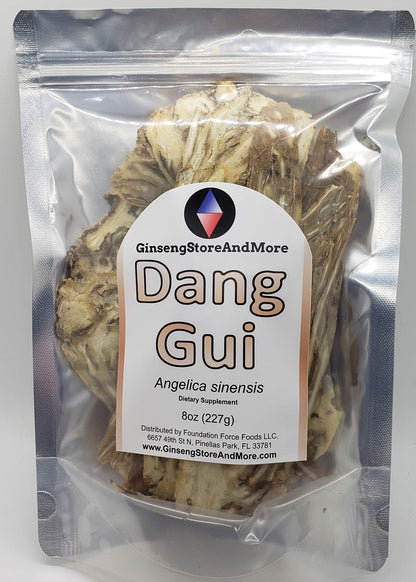 Sliced dried Angelica sinensis roots showing the natural yellowish-brown color and pliable texture.
