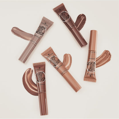 Side profile view of the 10 Milliliters Essence Baby Got Bronze tube highlighting the vegan logo.